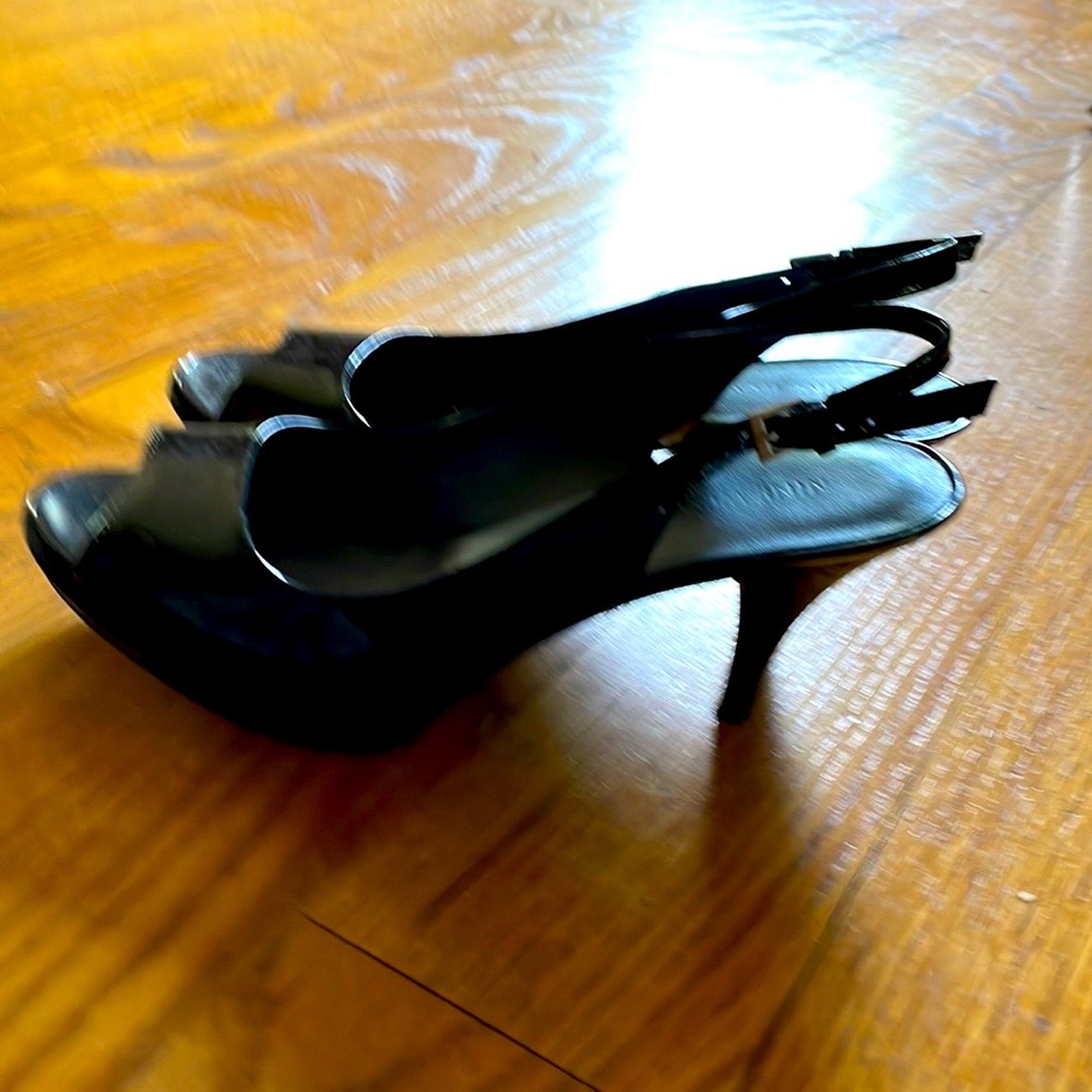 Nine West. Black patent leather open toe shoes. 3 inch heel. Worn once.